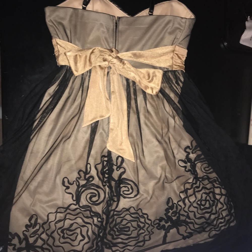 Gold and black dress by A. Byer